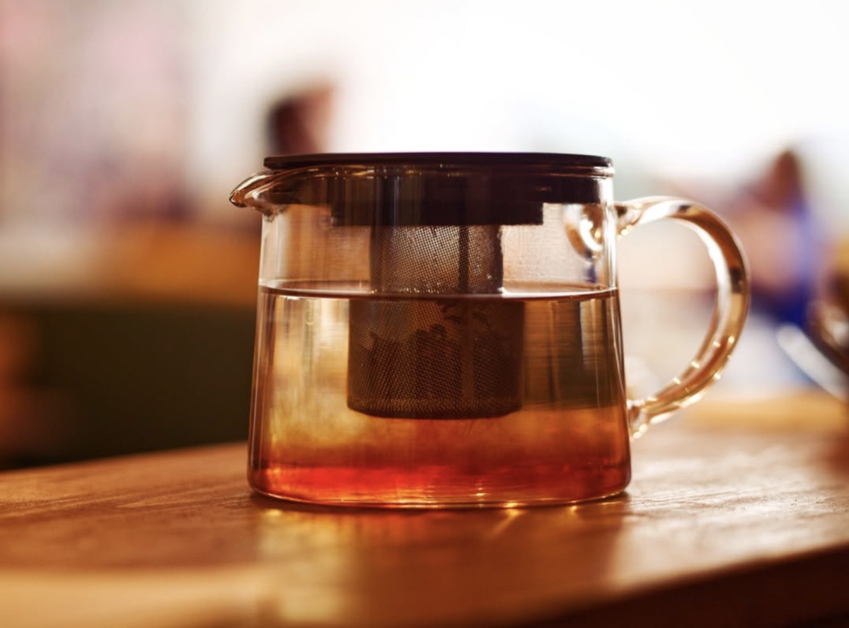 Glass teapot of loose-leaf tea